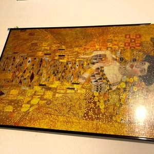 1000 piece puzzle completed and framed. Artist Gustav Klimt